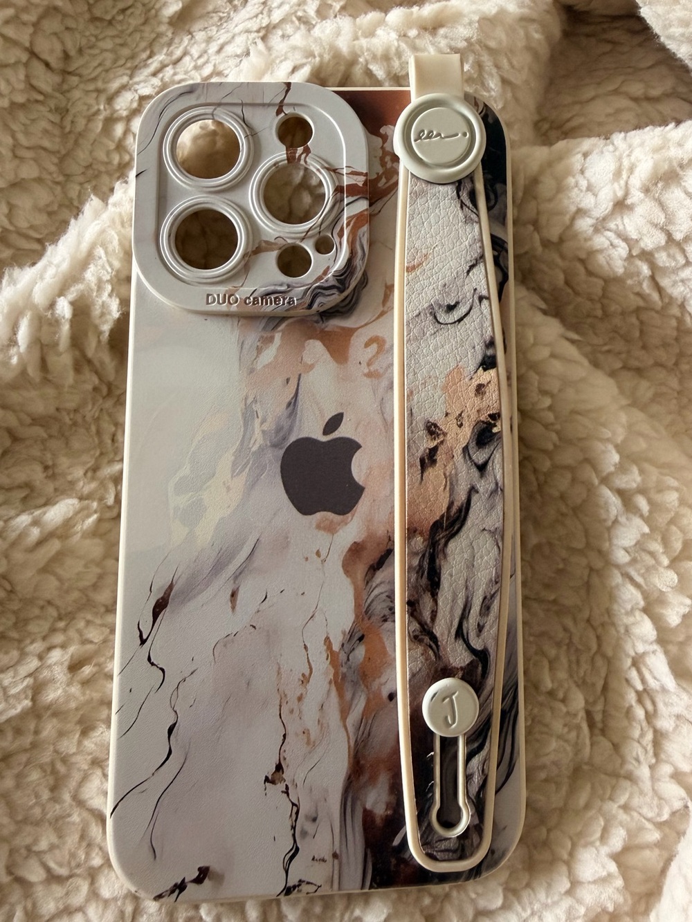 Apple Marble Pattern iPhone 13 Pro Case with Beige and Black Accents and grip